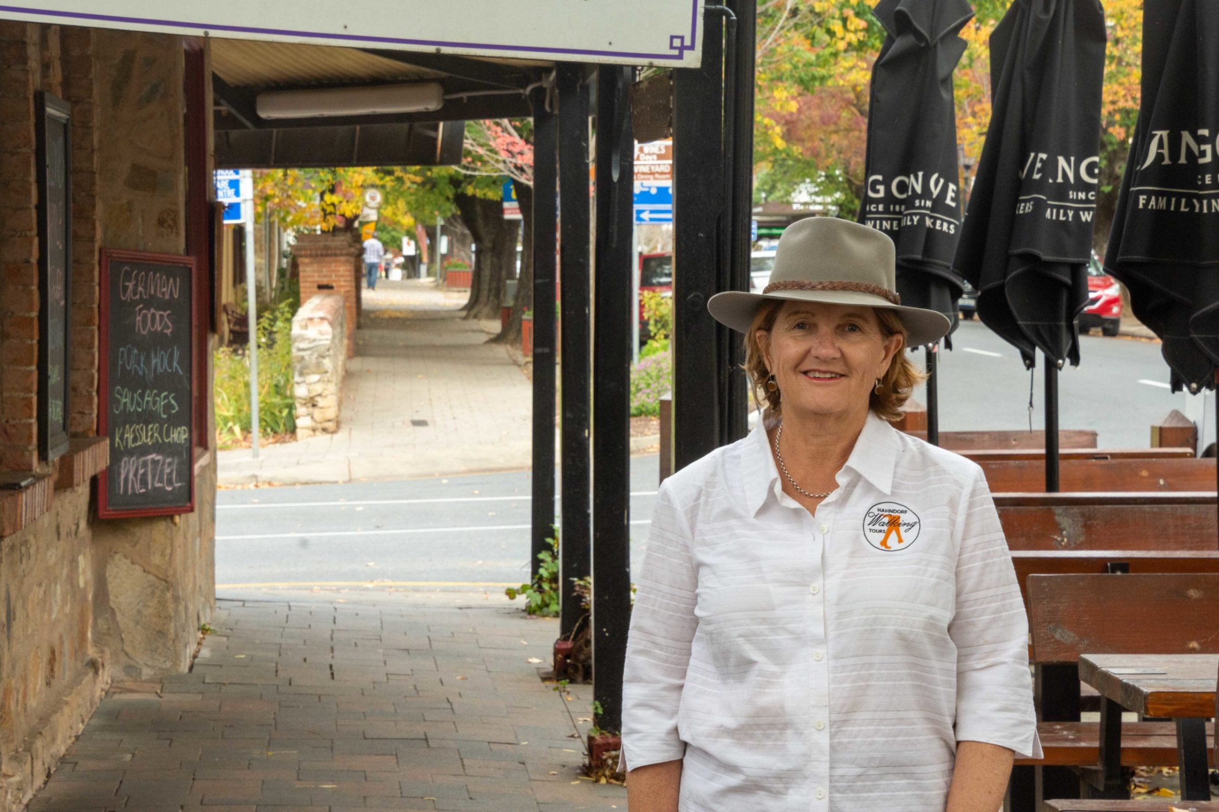 The guide standing in front of a store
