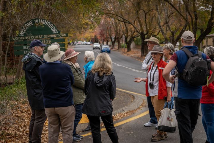 a group of people standing in front of a crowd
