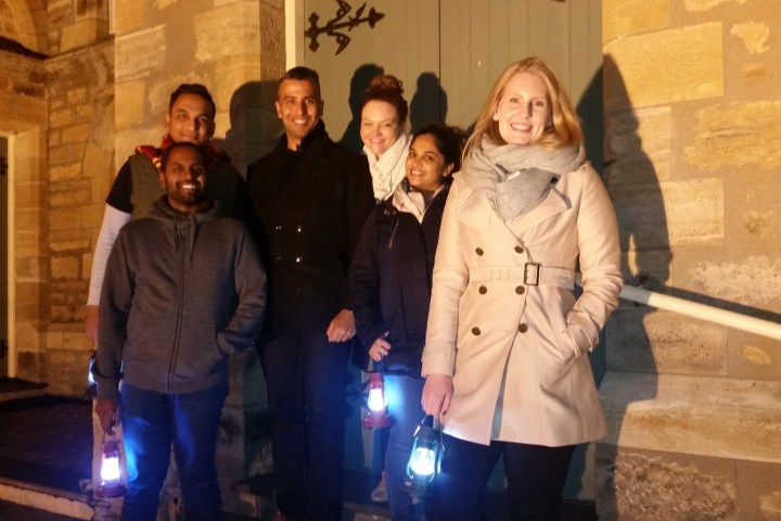 a group of people posing for the camera